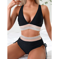 Black high-waisted tummy control bikini set on model